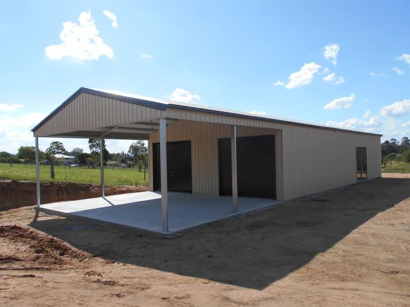 Zincalume garaport with a front awning and two doors on a new slab
