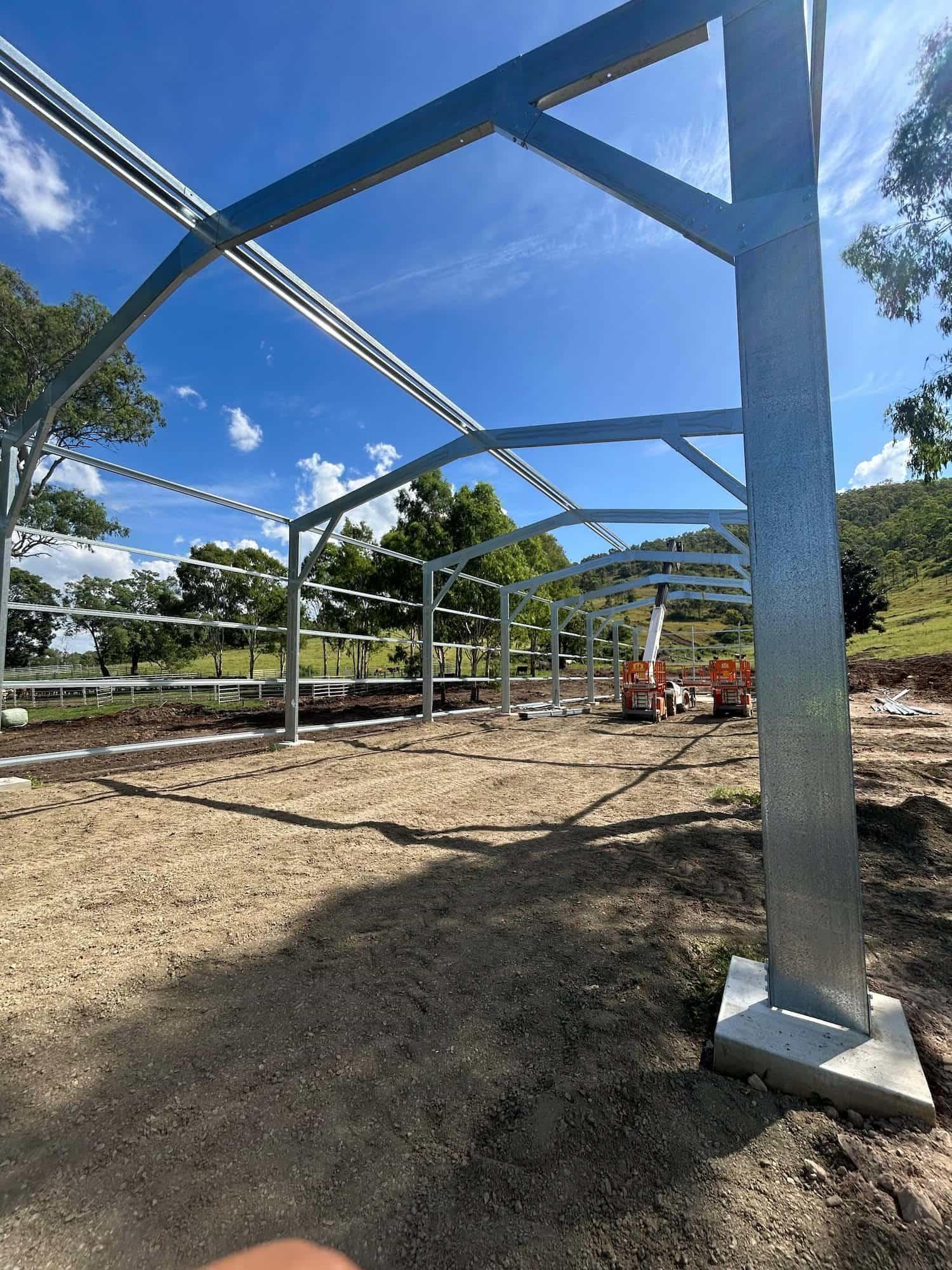 Galvanised column and rafters being erected